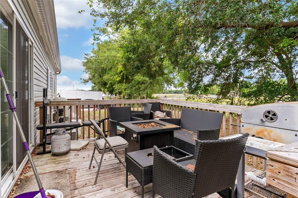 8010 Palmer Road Bartow, FL 33830 - Photo 20 of 22 a view of a dinning tables and chairs in a balcony