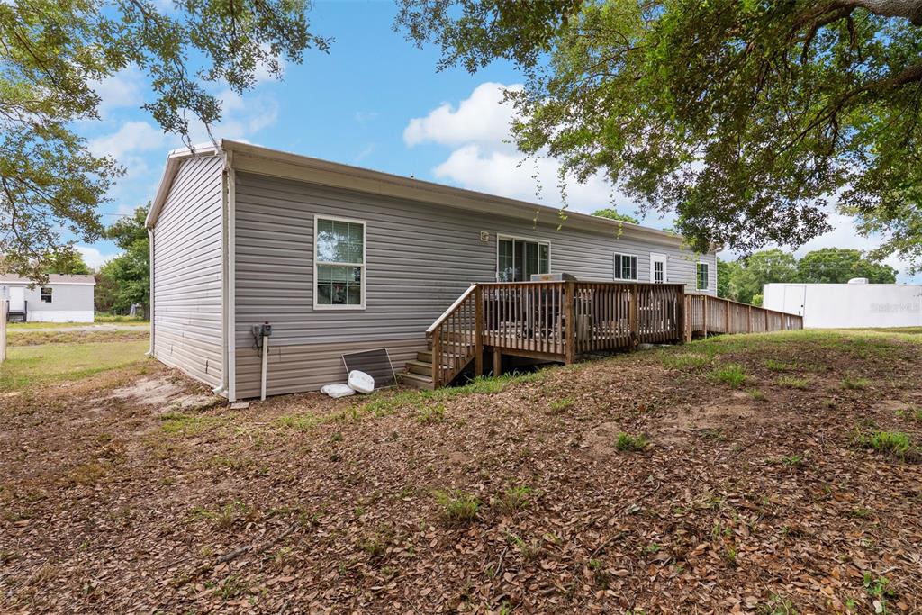 8010 Palmer Road Bartow, FL 33830 - Photo 22 of 22 a view of a house with a yard