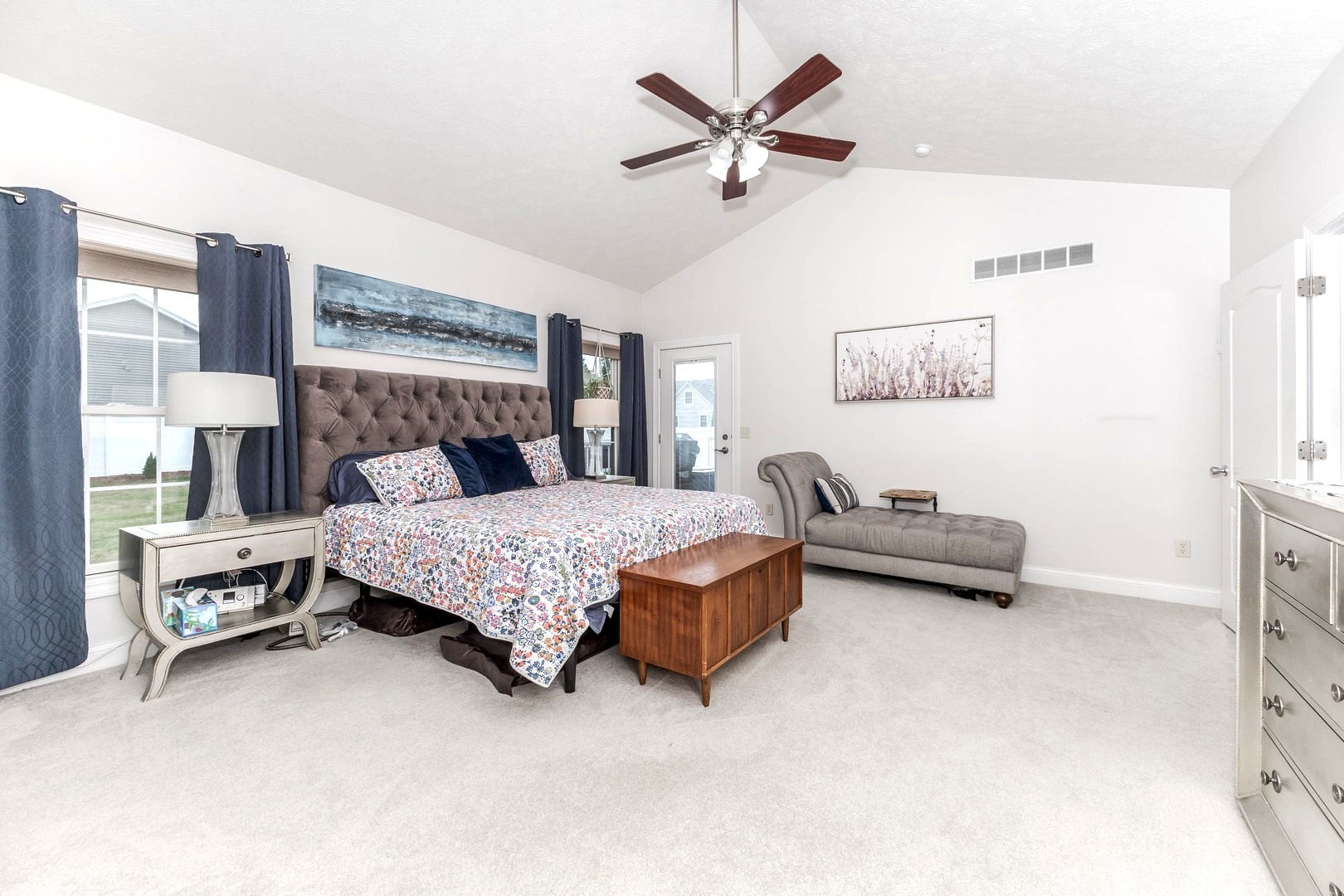 36 Lone Oak Court Bloomington, IL 61705 - Photo 27 of 63 a bedroom with a bed and a chandelier