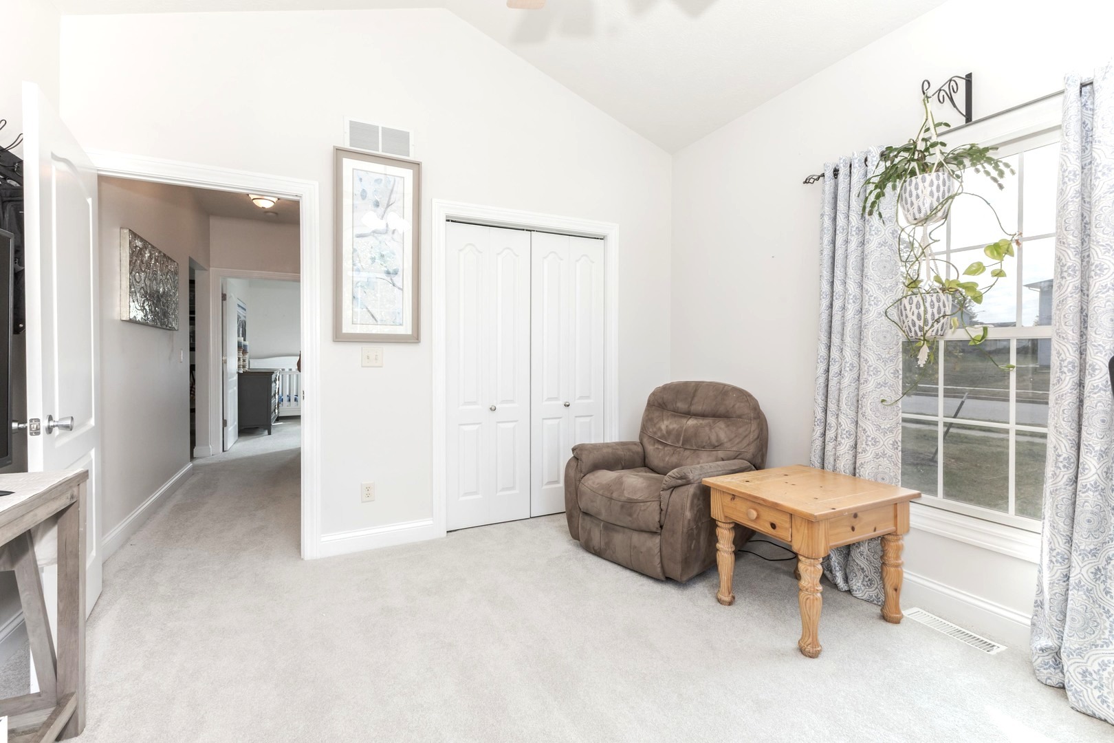 36 Lone Oak Court Bloomington, IL 61705 - Photo 35 of 63 a living room with furniture and a large window