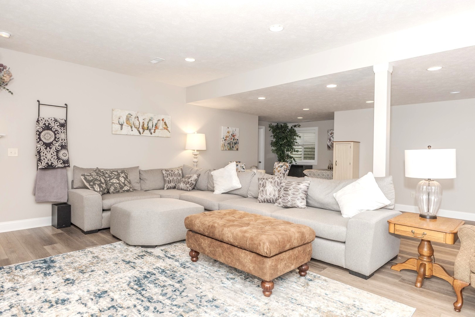 36 Lone Oak Court Bloomington, IL 61705 - Photo 38 of 63 a living room with furniture and a lamp