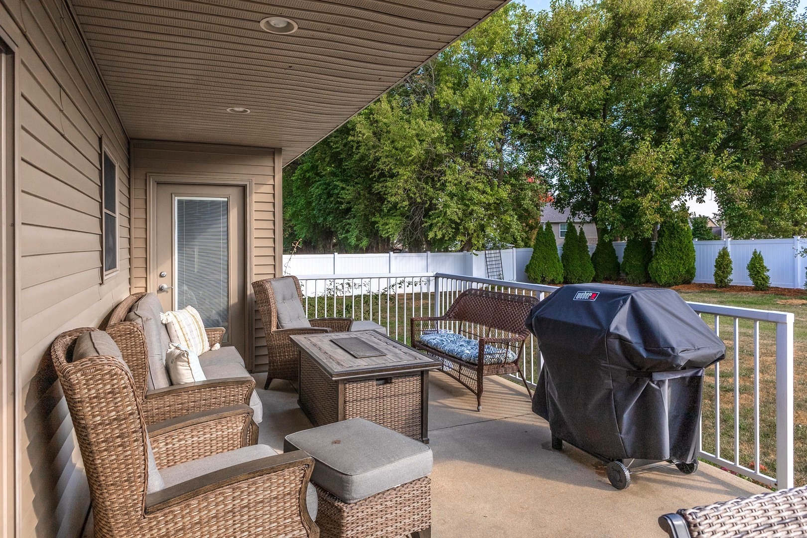 36 Lone Oak Court Bloomington, IL 61705 - Photo 45 of 63 a view of a patio with a table chairs and a potted plant