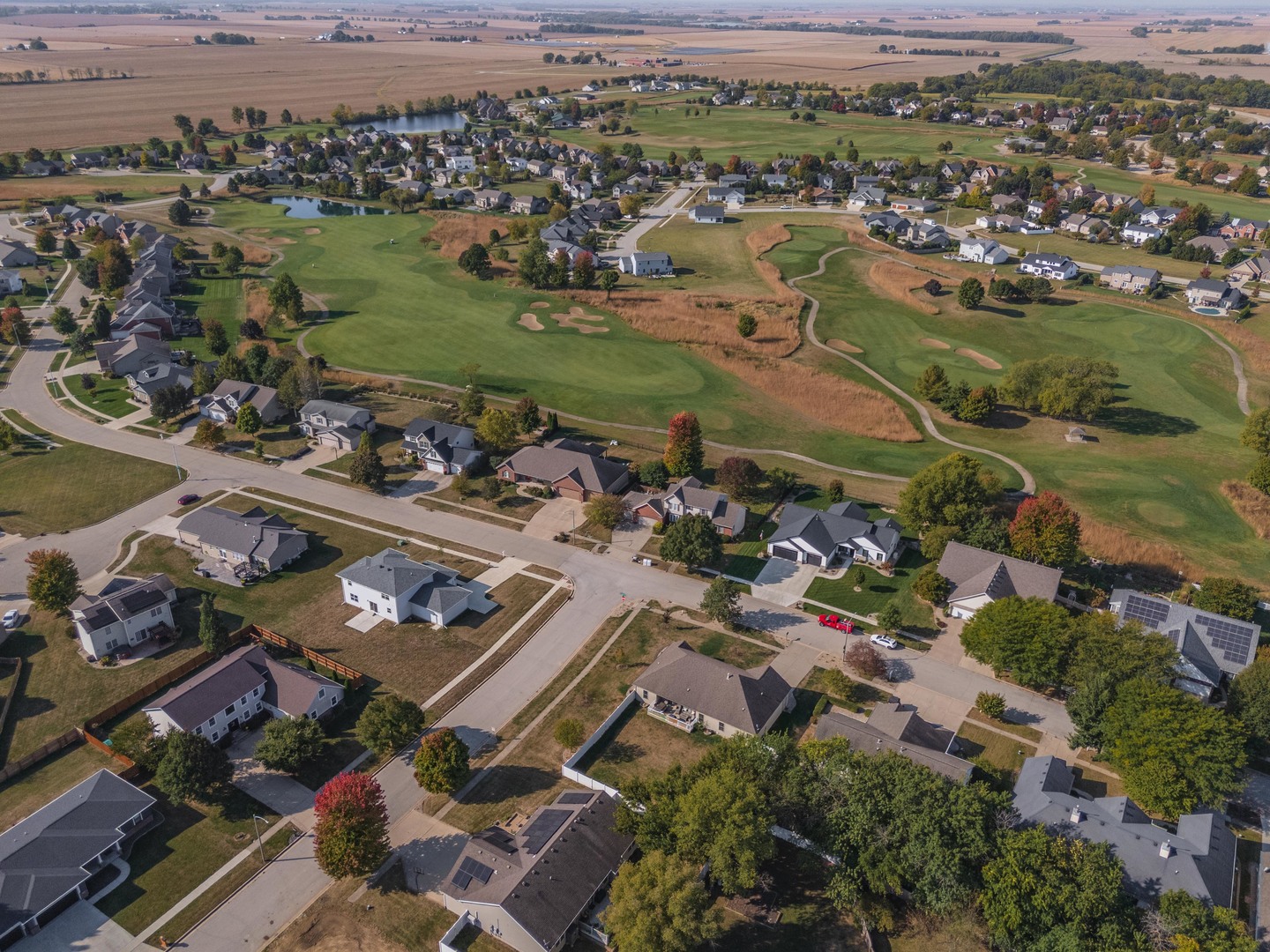 36 Lone Oak Court Bloomington, IL 61705 - Photo 52 of 63 an aerial view of a houses with a lake view
