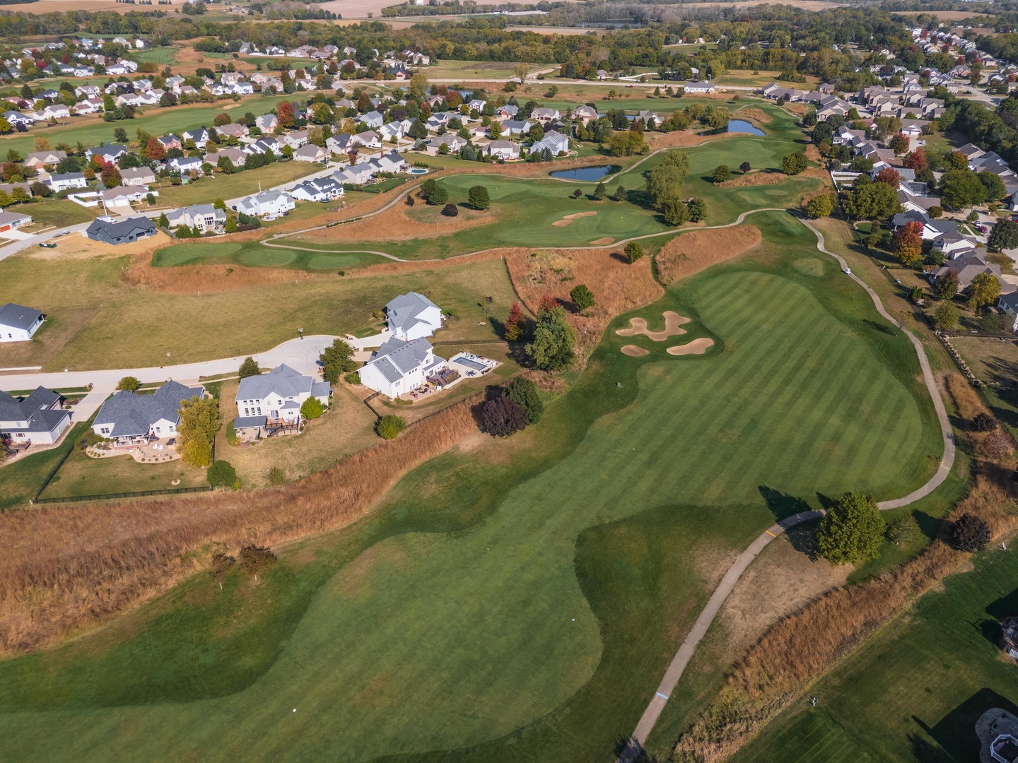 36 Lone Oak Court Bloomington, IL 61705 - Photo 55 of 63 an aerial view of a house with a lake view