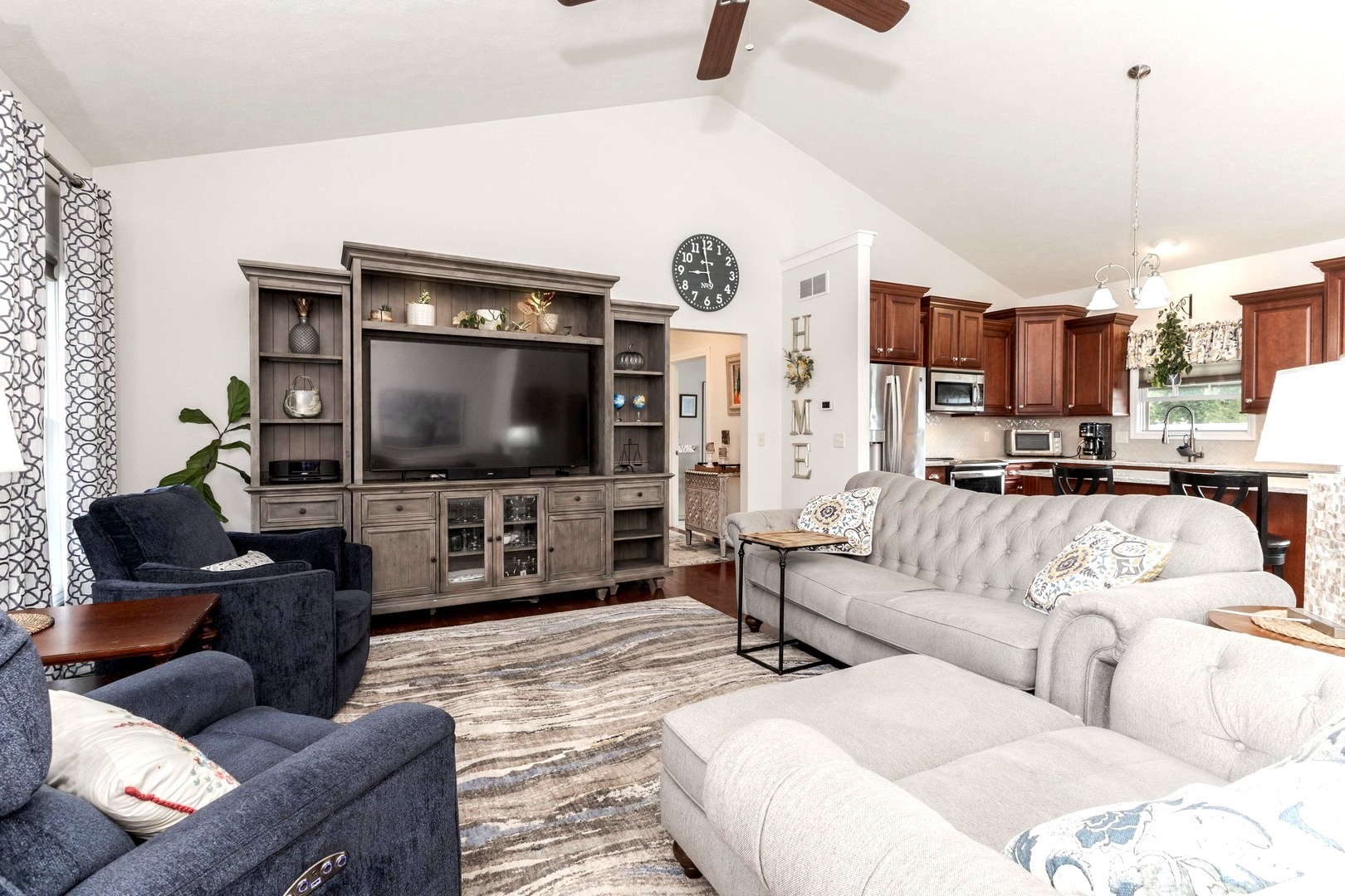 36 Lone Oak Court Bloomington, IL 61705 - Photo 8 of 63 a living room with furniture and a flat screen tv