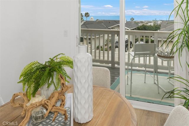 a view of balcony with furniture