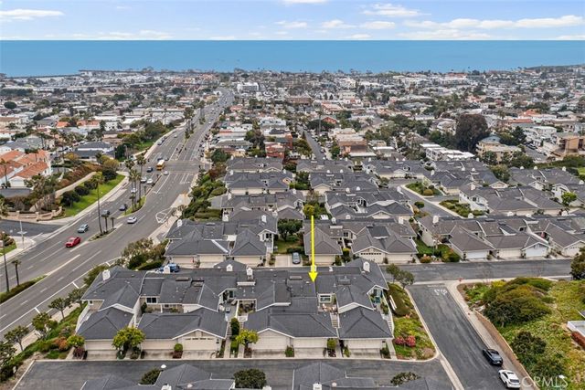 an aerial view of a city with lots of residential buildings