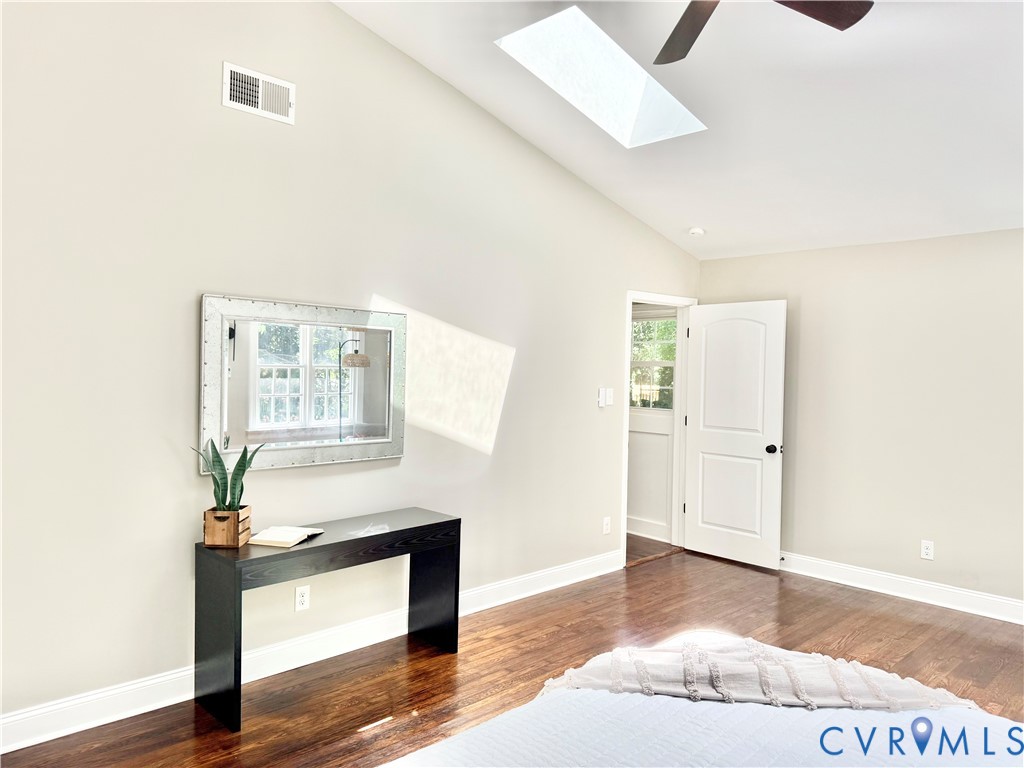 7335 Cherokee Road Richmond, VA 23225 - Photo 15 of 30 a living room with furniture and a wooden floor