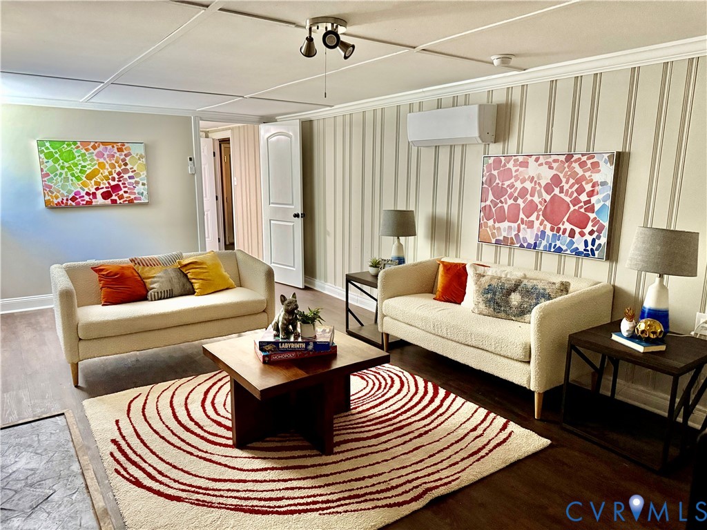 7335 Cherokee Road Richmond, VA 23225 - Photo 27 of 30 a living room with furniture and a large window