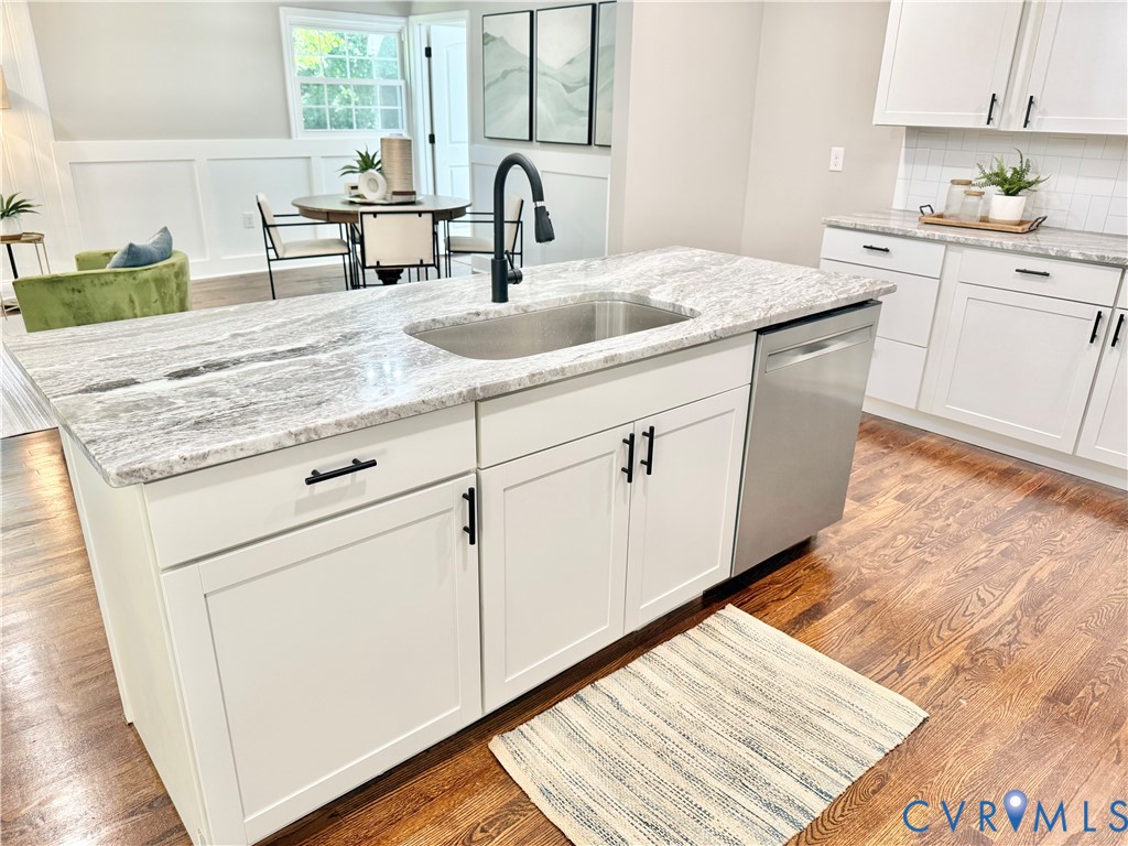 7335 Cherokee Road Richmond, VA 23225 - Photo 6 of 30 a kitchen with sink and cabinets