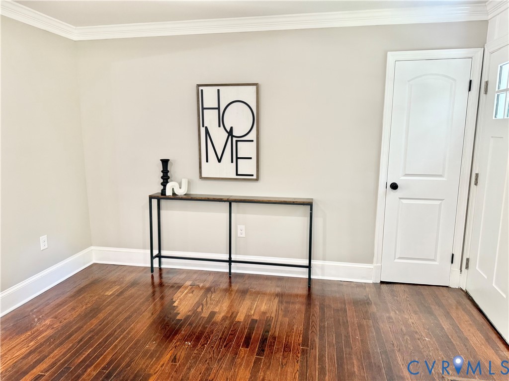 7335 Cherokee Road Richmond, VA 23225 - Photo 8 of 30 a view of a room with wooden floor