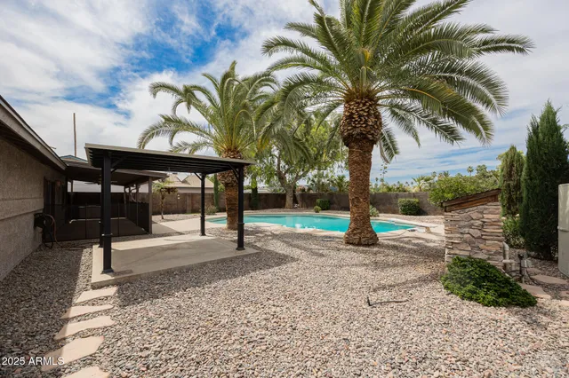 a sign board with a yard