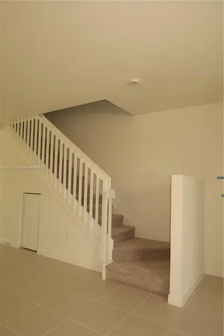 a view of an entryway with stairs