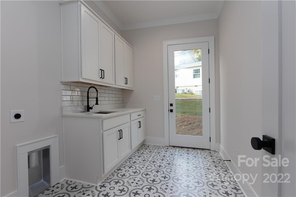 7209 Ramsgate Road Charlotte, NC 28270 - Photo 15 of 41 a room with a sink and a window