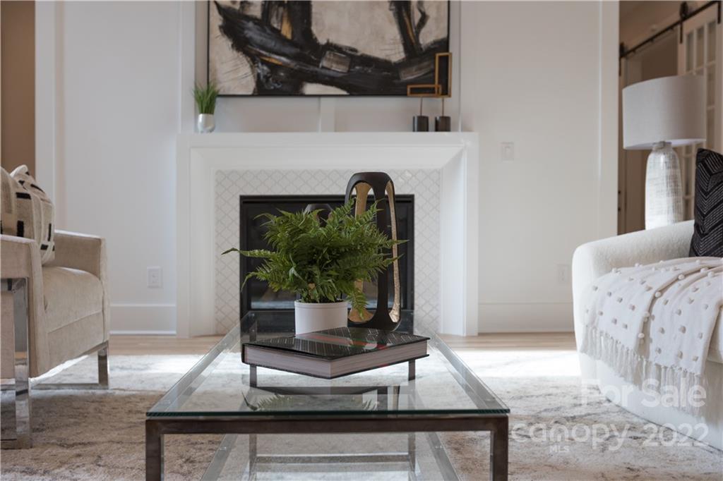 7209 Ramsgate Road Charlotte, NC 28270 - Photo 20 of 41 a living room with furniture and a fireplace