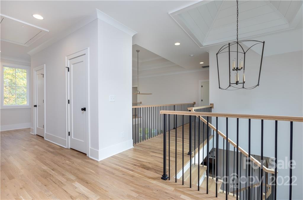 7209 Ramsgate Road Charlotte, NC 28270 - Photo 22 of 41 a view of hallway with wooden floor