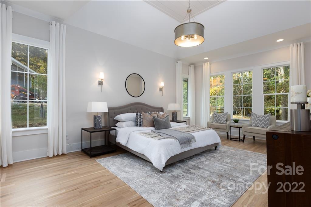 7209 Ramsgate Road Charlotte, NC 28270 - Photo 23 of 41 a bedroom with a bed couch and window