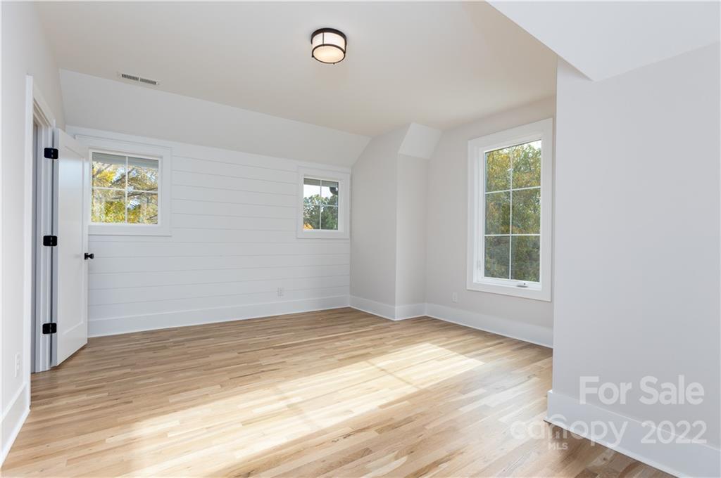 7209 Ramsgate Road Charlotte, NC 28270 - Photo 34 of 41 an empty room with windows
