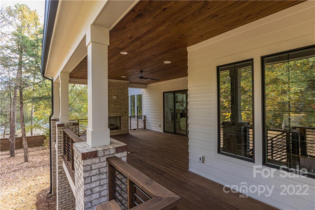 7209 Ramsgate Road Charlotte, NC 28270 - Photo 40 of 41 a view of a patio with table and chairs