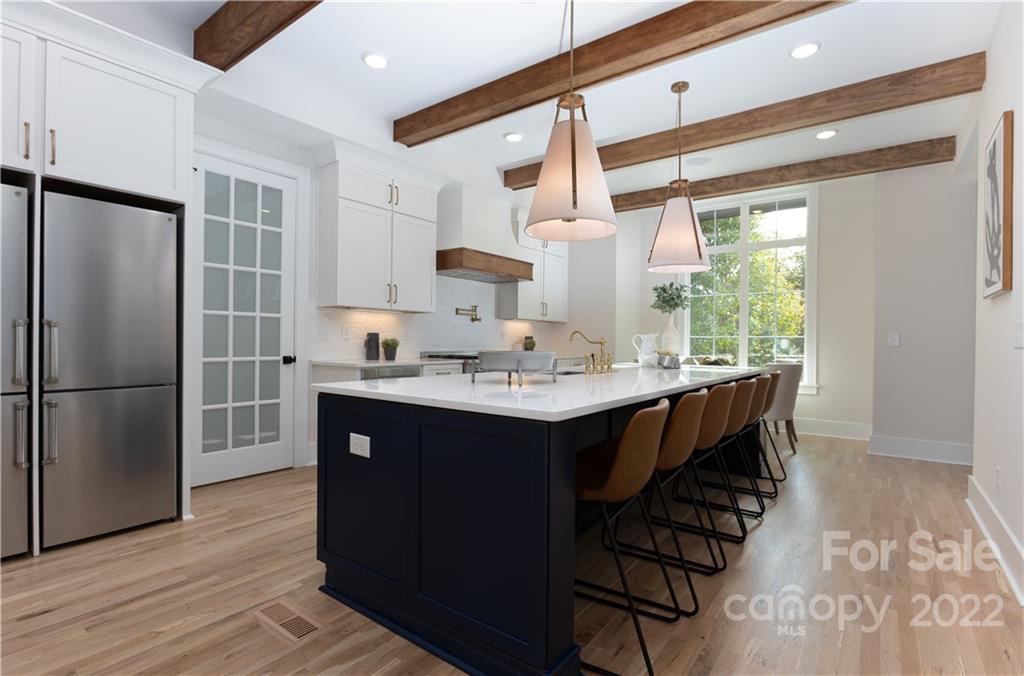 7209 Ramsgate Road Charlotte, NC 28270 - Photo 10 of 41 a kitchen with a sink appliances and cabinets