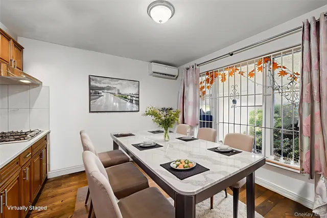 a view of a dining room with furniture window and outside view