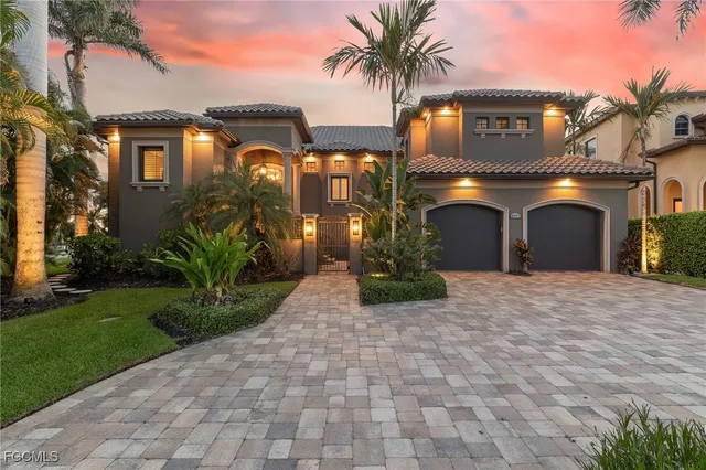 a view of a patio with couches chairs and a potted plant