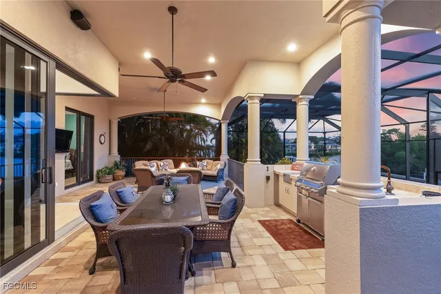 a view of a swimming pool with a patio