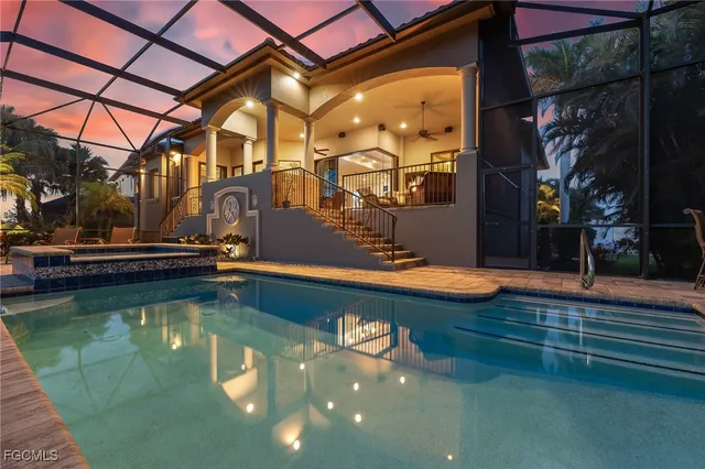 a view of swimming pool with a seating space