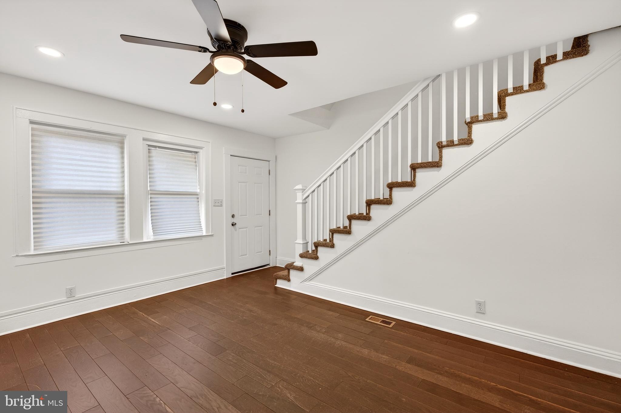 7014 Belclare Road Baltimore, MD 21222 - Photo 15 of 36 a view of an entryway with wooden floor