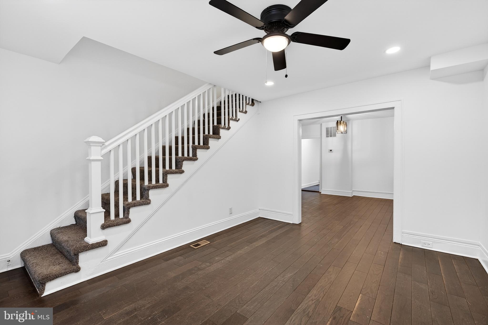 7014 Belclare Road Baltimore, MD 21222 - Photo 16 of 36 an entryway in a hall with wooden floor