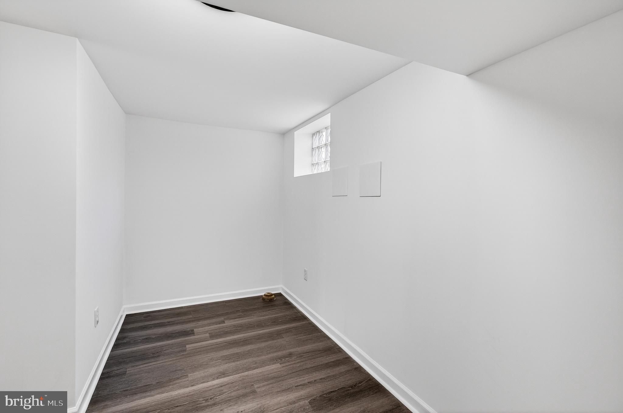 7014 Belclare Road Baltimore, MD 21222 - Photo 18 of 36 a view of small space with wooden floor