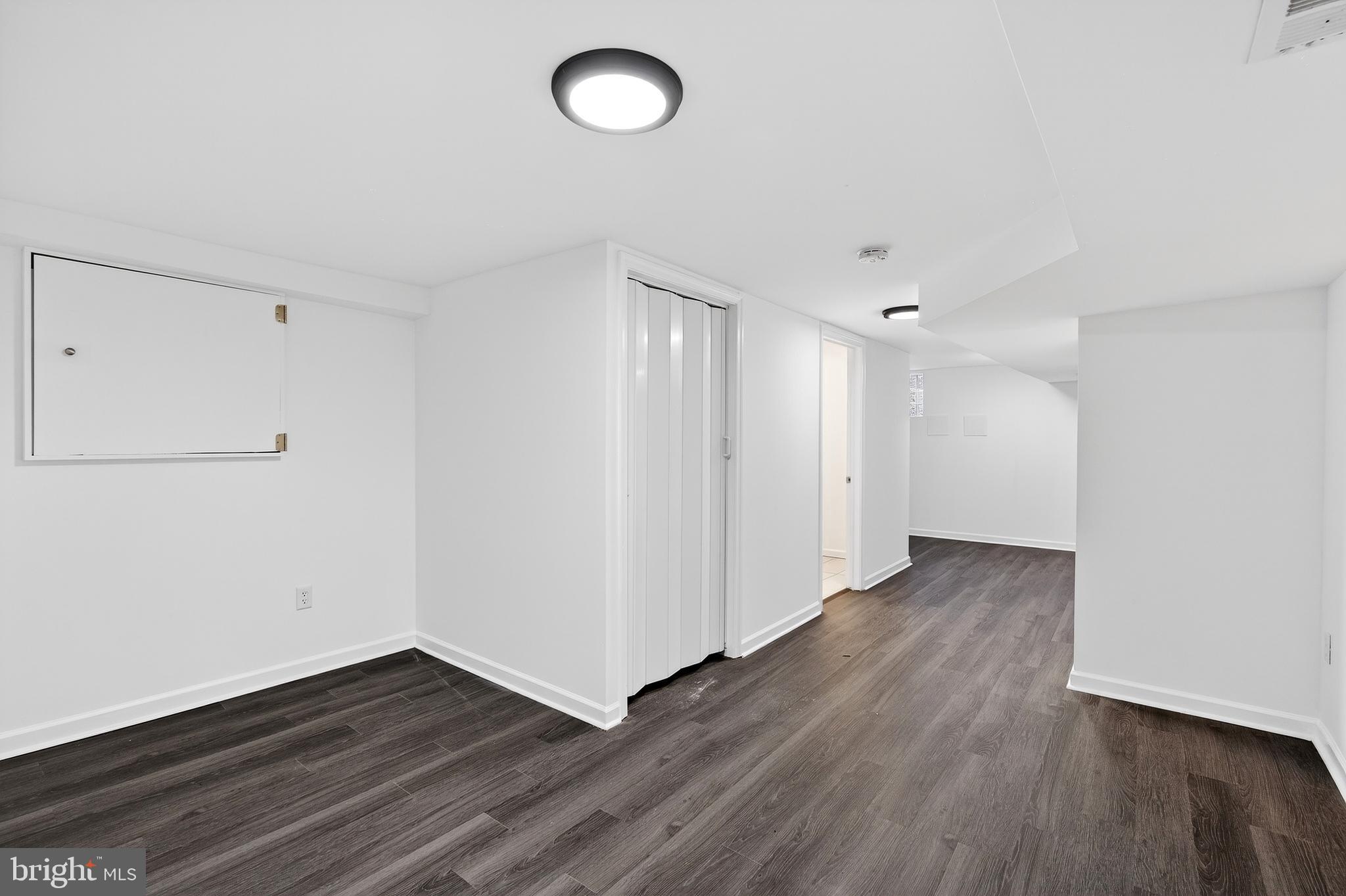 7014 Belclare Road Baltimore, MD 21222 - Photo 20 of 36 a view of a room with wooden floor