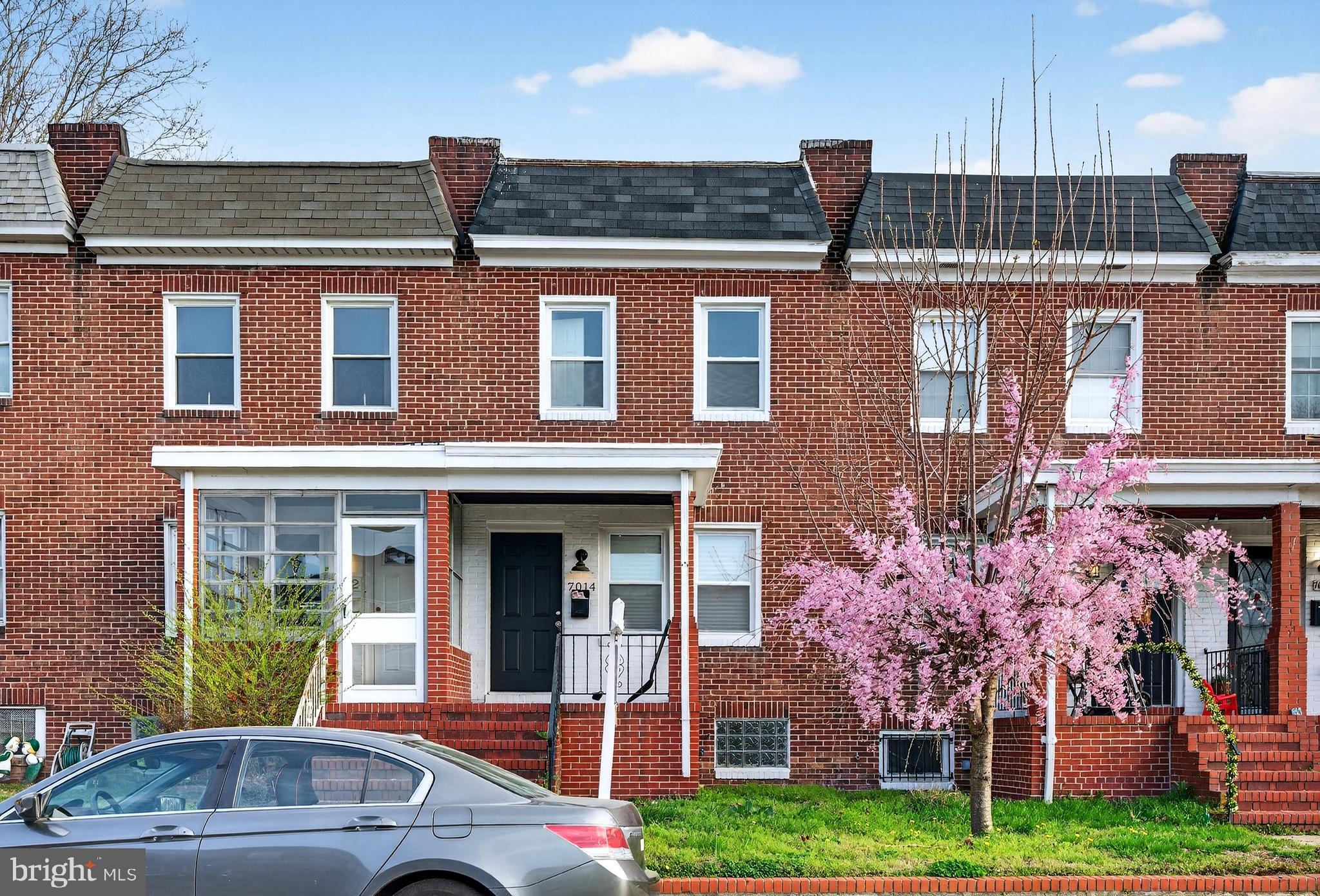 7014 Belclare Road Baltimore, MD 21222 - Photo 30 of 36 a front view of a house with garden