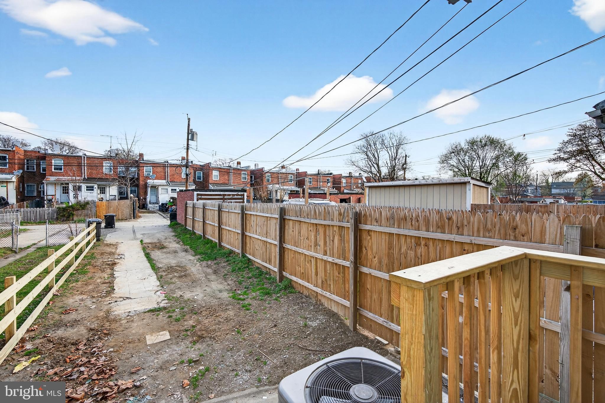 7014 Belclare Road Baltimore, MD 21222 - Photo 35 of 36 a view of a balcony with wooden floor