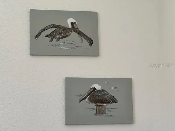 a close up of a painting on a wall