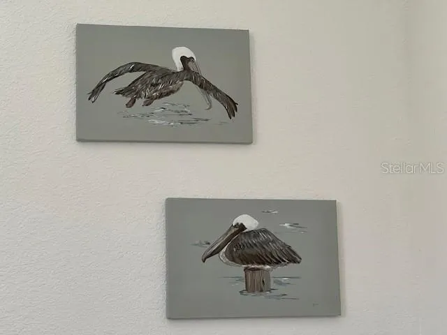 a close up of a painting on a wall