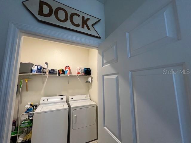 3181 Matecumbe Key Road, Unit 10 Punta Gorda, FL 33955 - Photo 24 of 52 a utility room with dryer and washer