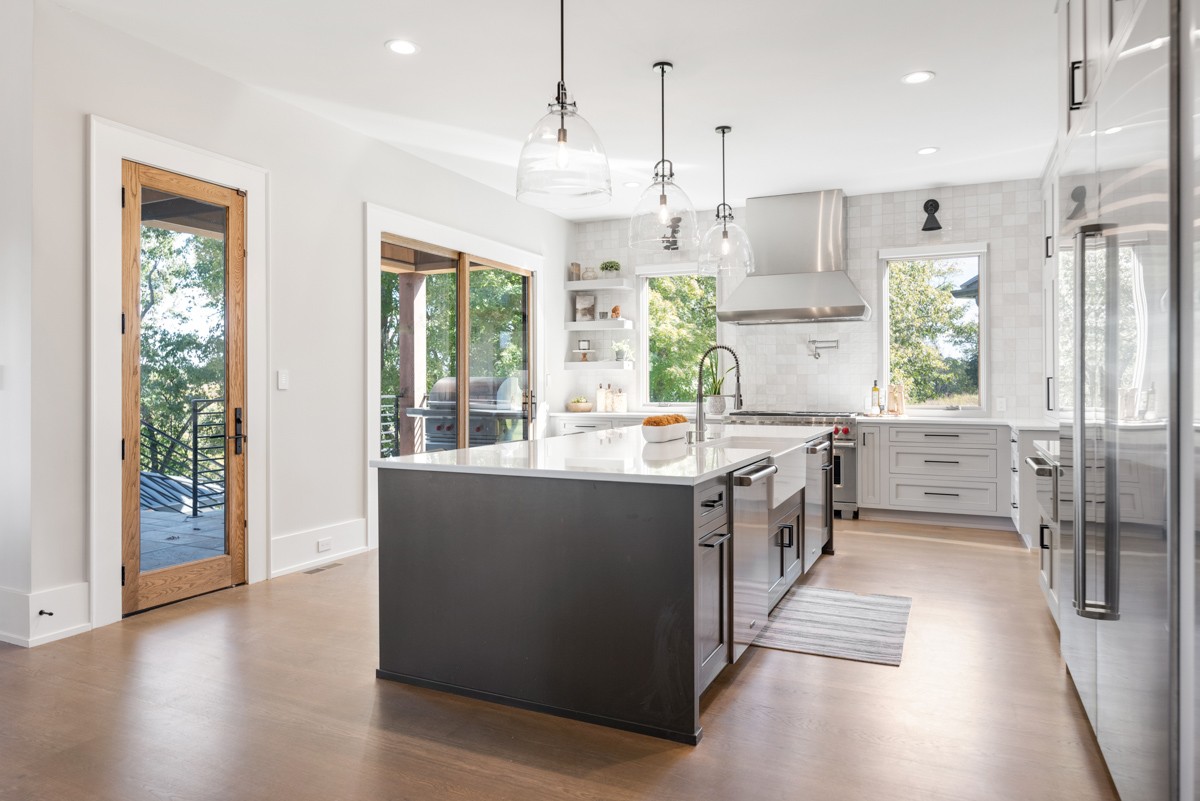 5893 Cairo Bend Road Lebanon, TN 37087 - Photo 11 of 47 a large kitchen with stainless steel appliances kitchen island granite countertop a large counter top and stainless steel appliances