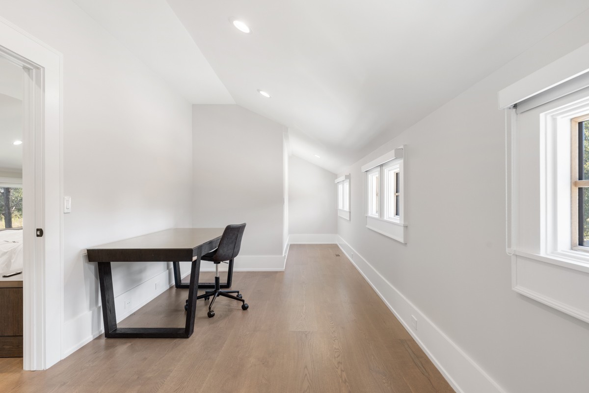 5893 Cairo Bend Road Lebanon, TN 37087 - Photo 31 of 47 a view of a hallway with windows and lounge chair