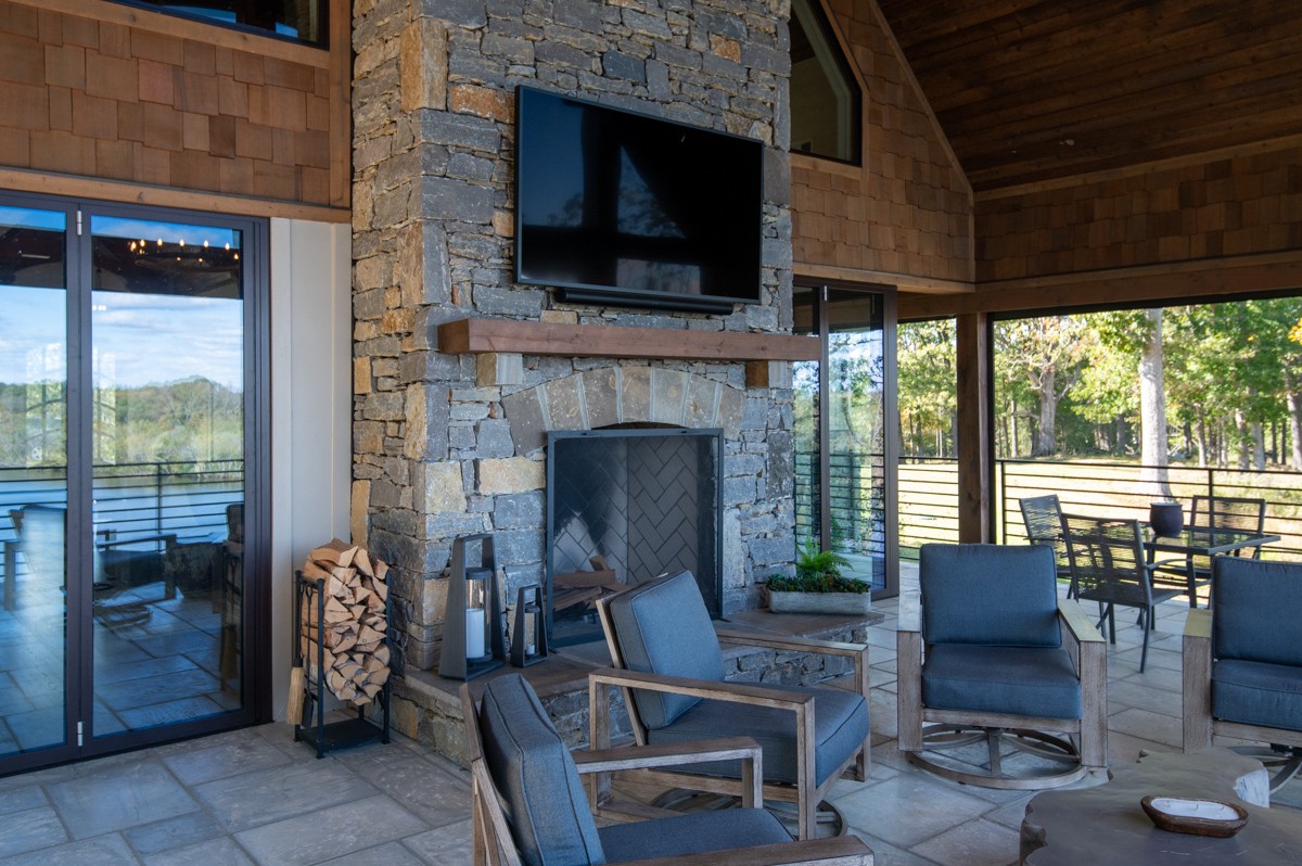 5893 Cairo Bend Road Lebanon, TN 37087 - Photo 39 of 47 a living room with furniture a flat screen tv and a fireplace