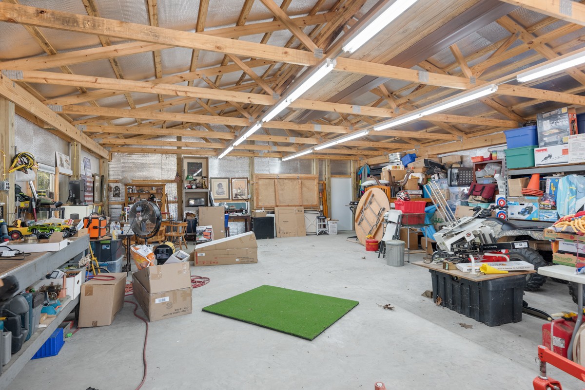 5893 Cairo Bend Road Lebanon, TN 37087 - Photo 44 of 47 a view of a garage with a lot of stuff