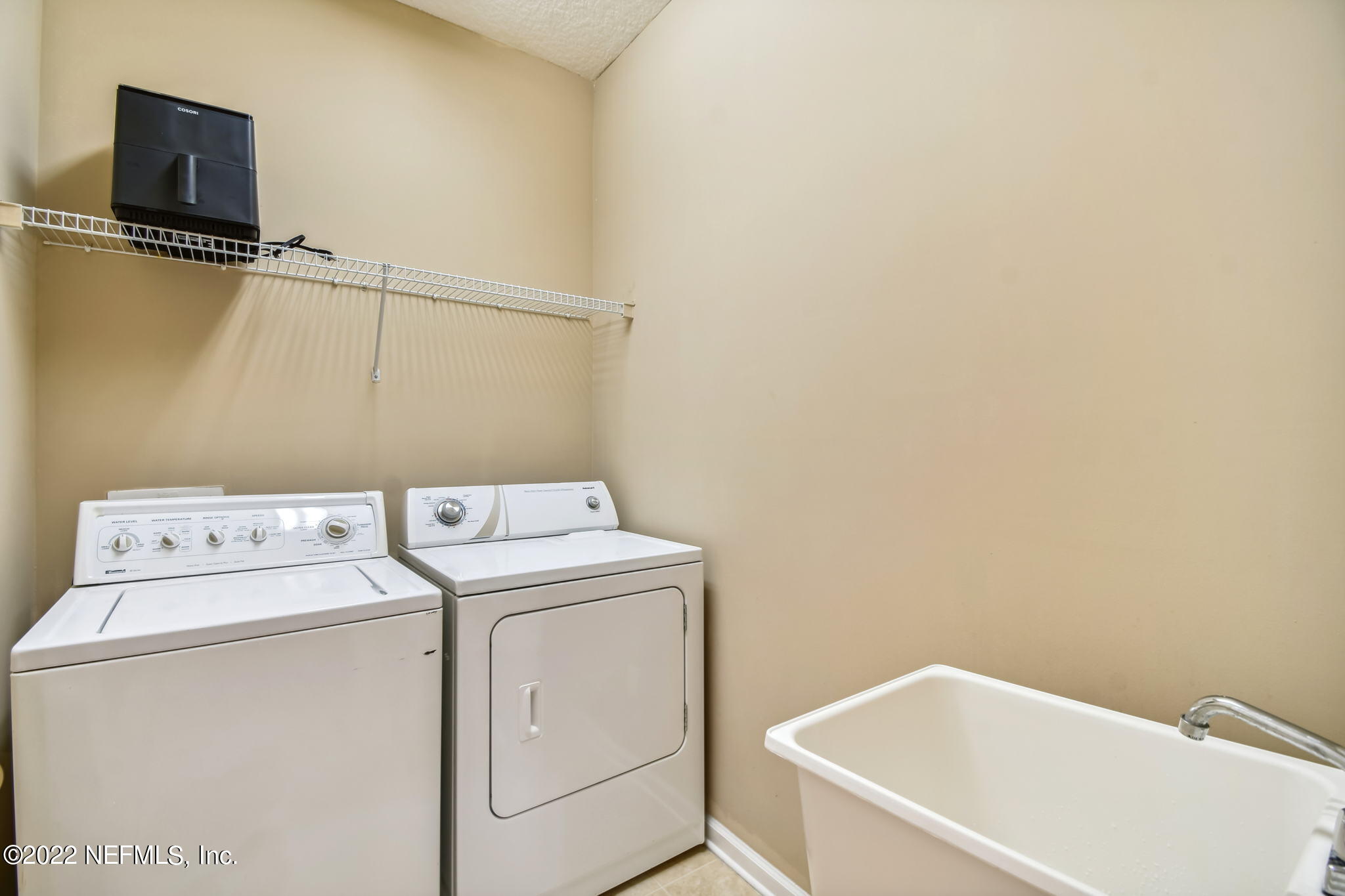 6469 Ginnie Springs Road Jacksonville, FL 32258 - Photo 19 of 51 Laundry Room