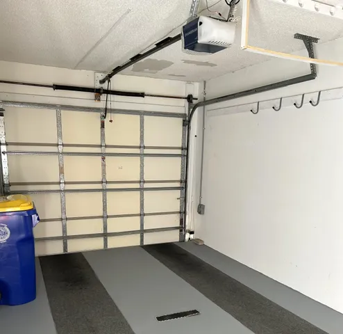 a kitchen with stainless steel appliances granite countertop a sink a stove a refrigerator and dishwasher