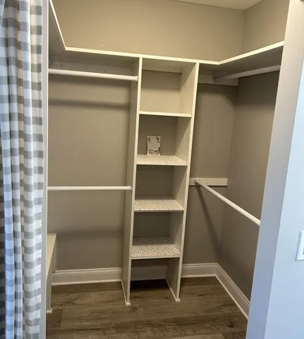 a kitchen with a refrigerator stove and microwave