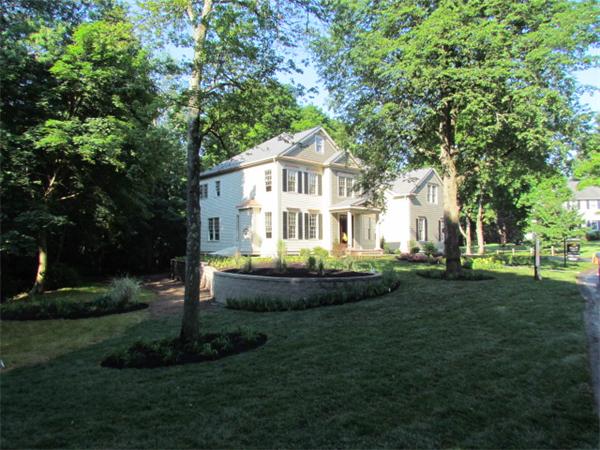 84 Glendale Road Needham, MA 02492 - Photo 2 of 2 a front view of a house with garden