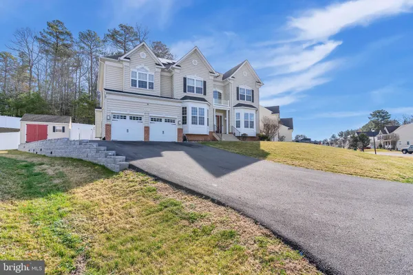 a view of a house with a swimming pool