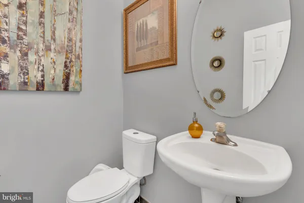 a view of a livingroom with furniture and workspace
