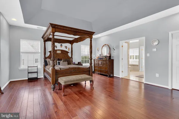 an aerial view of a house with a big yard