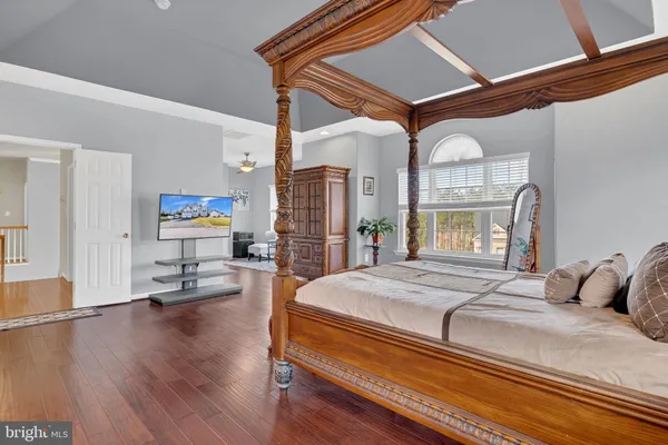 an aerial view of a house with a swimming pool