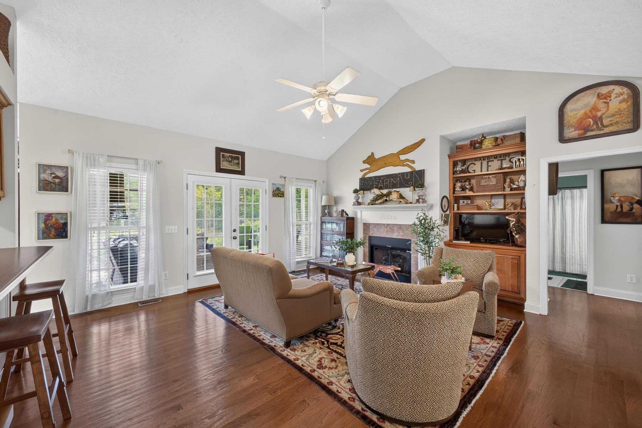 42 Emerald Ridge Aiken, SC 29803 - Photo 8 of 33 a living room with fireplace furniture and a wooden floor
